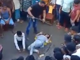 BJP vs Trinamool Over Chilling Video Of Woman's Public Flogging In Bengal BJP vs Trinamool Over Chilling Video Of Woman's Public Flogging In Bengal