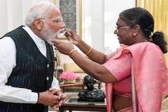 President Murmu Feeds "Dahi-Cheeni" To PM Modi Ahead Of Swearing-in Ceremony President Murmu Feeds "Dahi-Cheeni" To PM Modi Ahead Of Swearing-in Ceremony