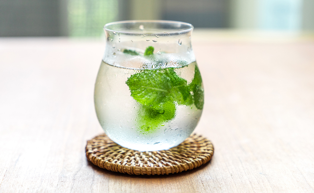 Glass of mint water for digestion.