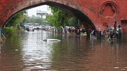 8 Stunning Pics Of Delhi Flooded And Struggling After First Heavy Rain