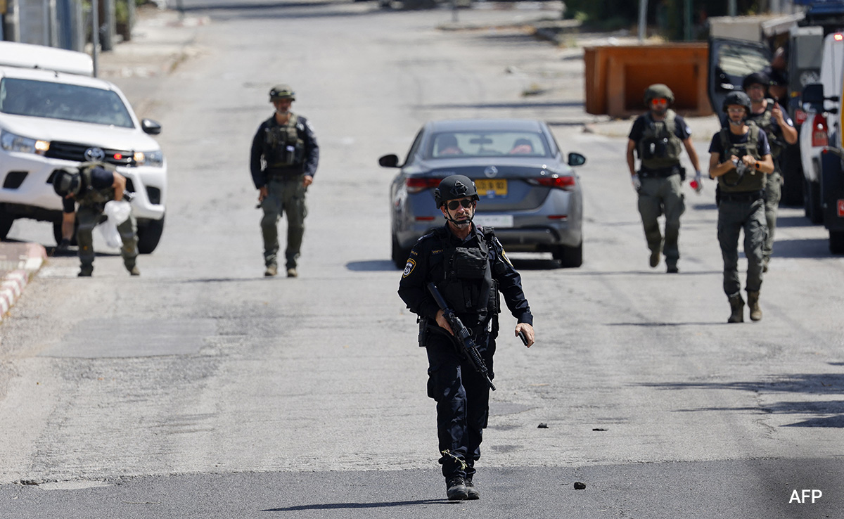Israeli Forces Tie Wounded Palestinian To Jeep In West Bank Raid
