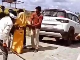Woman Beaten With A Stick In Madhya Pradesh, Bystanders Shoot Video Woman Beaten With A Stick In Madhya Pradesh, Bystanders Shoot Video