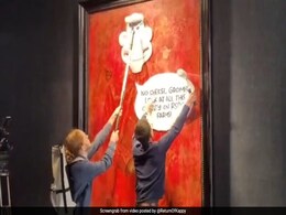 Animal Rights Activists Stick Cartoon Images On King Charles' Portrait Animal Rights Activists Stick Cartoon Images On King Charles' Portrait