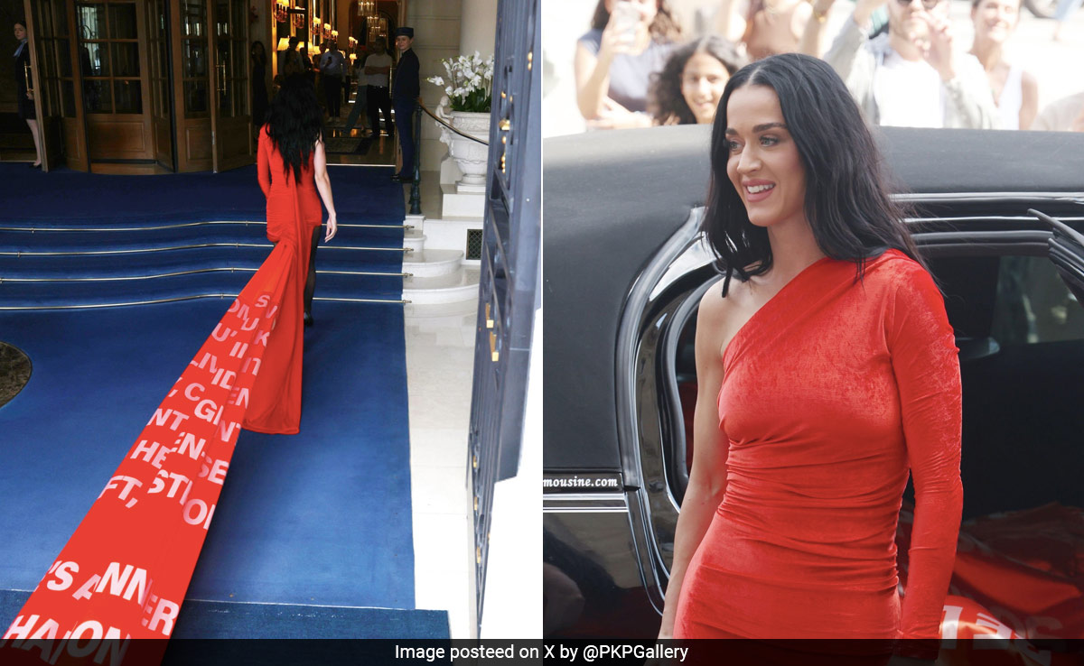 Katy Perry's Red Dress Had A Train Printed With <i>Woman's World</i> Song Lyrics That Spoke Volumes About Her Dramatic Style