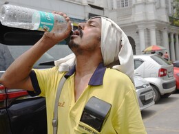 Pics: Hot, Hot, Hot In Delhi, But Some Have No Escape