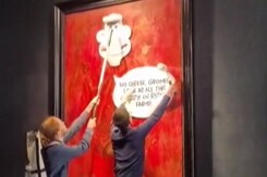 Animal Rights Activists Stick Cartoon Images On King Charles' Portrait Animal Rights Activists Stick Cartoon Images On King Charles' Portrait