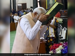 Watch: PM Modi Touches Constitution To Forehead At NDA Meeting Watch: PM Modi Touches Constitution To Forehead At NDA Meeting