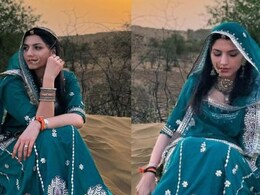 माथे पर बिंदी, नीले घाघरे- चोली में रेतीले धोरों पर बैठी नजर आई IAS परी बिश्नोई, देखें तस्वीरें