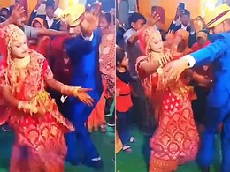 दूल्हे के साथ जमकर नाची दुल्हन, एनर्जेटिक डांस देख लोगों ने कहा- इसको रोको नहीं तो... दूल्हे के साथ जमकर नाची दुल्हन, एनर्जेटिक डांस देख लोगों ने कहा- इसको रोको नहीं तो...