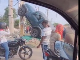 Thar SUV Drives Up Electric Pole After Being Hit By Sedan In Gurugram Thar SUV Drives Up Electric Pole After Being Hit By Sedan In Gurugram