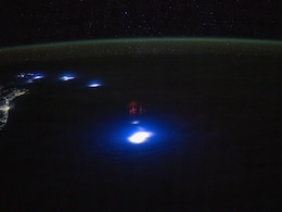 NASA Astronaut Captures Mysterious 'Red Sprites' Glowing In Earth's Atmosphere NASA Astronaut Captures Mysterious 'Red Sprites' Glowing In Earth's Atmosphere
