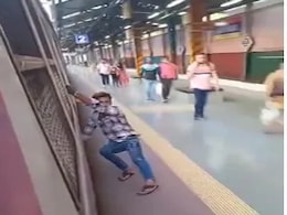 Video: Man Performs Stunt While Boarding Local Train In Mumbai Video: Man Performs Stunt While Boarding Local Train In Mumbai