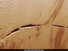 New Photos Unveil Massive Scar On Surface Of Mars In Unprecedented Detail New Photos Unveil Massive Scar On Surface Of Mars In Unprecedented Detail