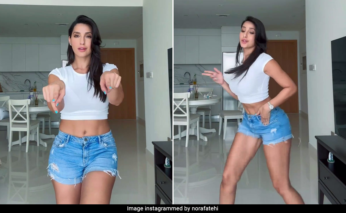 Even When She Does The <i>Tauba Tauba</i> Hook Step, Nora Fatehi In A White Tee And Denim Shorts Is Hard To Miss