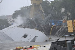 INS Brahmaputra Severely Damaged In Fire, Lying On Its Side; Sailor Missing INS Brahmaputra Severely Damaged In Fire, Lying On Its Side; Sailor Missing