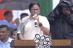 Defying Rain, Mamata Targets BJP at TMC's Martyr's Day Rally Defying Rain, Mamata Targets BJP at TMC's Martyr's Day Rally