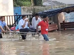 Video: With Road Flooded, Medical College Principal Taken Out On A Stretcher Video: With Road Flooded, Medical College Principal Taken Out On A Stretcher