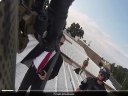 New Footage Shows US Officers Standing Over Body Of Trump Shooter New Footage Shows US Officers Standing Over Body Of Trump Shooter