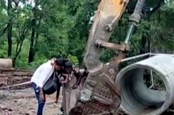 Excavator Helps Pregnant Woman Cross Flooded 'Nullah' In Gadchiroli