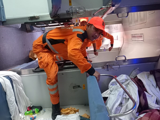 Watch: Rescue Teams Crawl Through Derailed Coaches Looking For Survivors