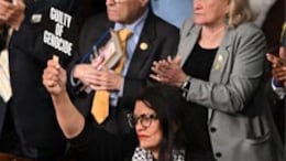 US Lawmaker Hold Ups "War Criminal" Sign During Netanyahu's Congress Speech