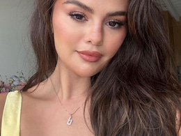 Selena Gomez Loves A Little PDA Shown With Her "B" Pendant Necklace For Her Boyfriend Singer Benny Blanco Selena Gomez Loves A Little PDA Shown With Her "B" Pendant Necklace For Her Boyfriend Singer Benny Blanco