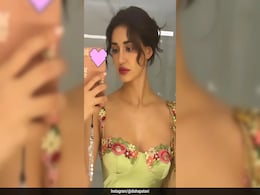 Disha Patani May As Well Have Plucked The Red Daisies From Her Dress To Match Her Wine Red Lip Colour Disha Patani May As Well Have Plucked The Red Daisies From Her Dress To Match Her Wine Red Lip Colour