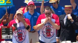 Hot Dog Eating Contest: Man Eats 58 Hot Dogs In 10 Minutes To Win The Mustard Belt And $20,000 Prize