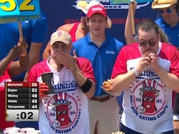 Hot Dog Eating Contest: Man Eats 58 Hot Dogs In 10 Minutes To Win The Mustard Belt And $20,000 Prize Hot Dog Eating Contest: Man Eats 58 Hot Dogs In 10 Minutes To Win The Mustard Belt And $20,000 Prize
