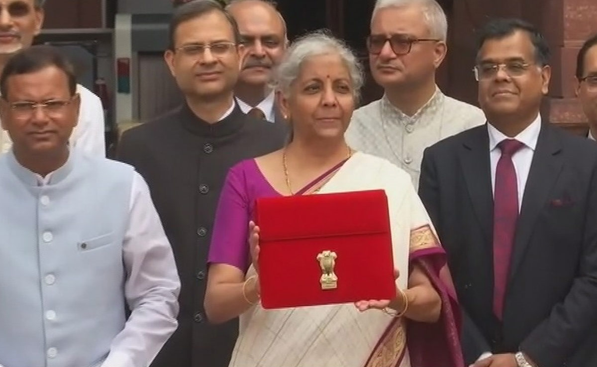 Finance Minister Poses With Tablet In Red Sleeve Ahead Of Budget Speech Finance Minister Poses With Tablet In Red Sleeve Ahead Of Budget Speech