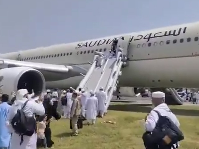 Watch: Fliers Slide Down Plane After Its Landing Gear Catches Fire In Pak