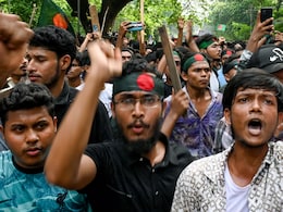 Bangladesh Eases Curfew, Garment Factories, Banks Re-open After Protests Bangladesh Eases Curfew, Garment Factories, Banks Re-open After Protests