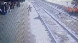 Video: Woman Hit By Train While Crossing Railway Tracks On Platform, Saved By Cop