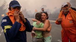 Residents Flee As Greece Wildfires Spread Despite "Superhuman" Efforts
