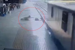Woman Hit By Train While Crossing Railway Tracks, Saved By Alert Cop Woman Hit By Train While Crossing Railway Tracks, Saved By Alert Cop