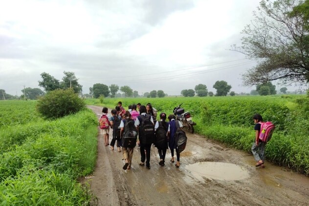 Student in Muddy Road Student in Muddy Road