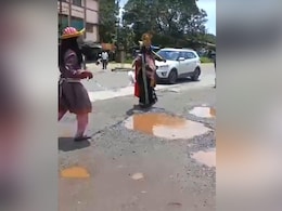 Video: "Yamaraja" Conducts Long Jump Competition On Pothole-Ridden Road Video: "Yamaraja" Conducts Long Jump Competition On Pothole-Ridden Road