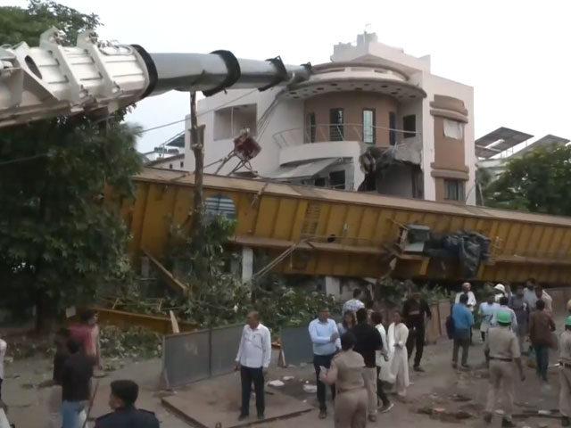 A Crane Falls Onto Building During Metro Construction Work In Surat, None Hurt