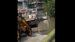 Video: Foreigners Taken On Bulldozer Ride On Flooded Road In Gujarat's Vadodara