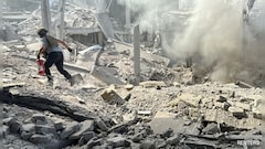 Russian Strikes In Ukraine's Kharkiv Kill Infant In Stroller, 5 Others