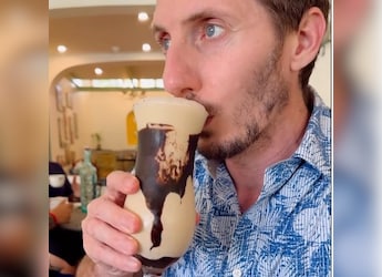 Cold Coffee Face-Off: Woman Makes Italian Partner Try Indian Cold Coffee For First Time, His Reaction... Cold Coffee Face-Off: Woman Makes Italian Partner Try Indian Cold Coffee For First Time, His Reaction...