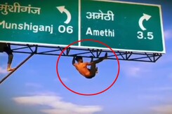 UP Man Takes Reel Game A Notch "Higher", Does Pull Ups On Highway Signboard UP Man Takes Reel Game A Notch "Higher", Does Pull Ups On Highway Signboard