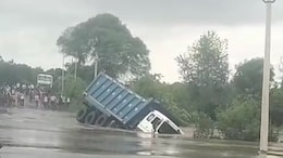 Video: Dumper Truck Sinks As Driver Tries To Take It Across Flooded Bridge In UP