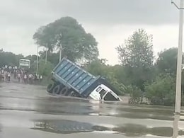 Video: Dumper Truck Sinks As Driver Tries To Take It Across Flooded Bridge In UP