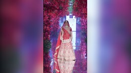 Hina Khan Is Unstoppable And She Proves It With A Ramp Walk In A Bridal Red <i>Lehenga</i>