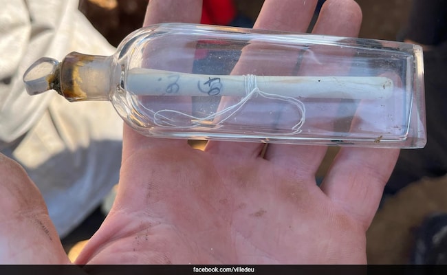 Glass Bottle With 200-Year-Old Message Found At French Archaeological Site Glass Bottle With 200-Year-Old Message Found At French Archaeological Site