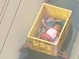 Video:  Baby In Plastic Crate Carried By Men In Neck-Deep Andhra Flood Waters Video:  Baby In Plastic Crate Carried By Men In Neck-Deep Andhra Flood Waters