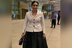 Sonam Kapoor Poses With A Young Fan At Airport Sonam Kapoor Poses With A Young Fan At Airport