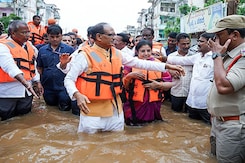 Union Minister Shivraj Chouhan Wades Through Knee-Deep Water In Flood-Hit Vijayawada Union Minister Shivraj Chouhan Wades Through Knee-Deep Water In Flood-Hit Vijayawada