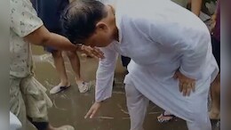 Video : MP के इस मंत्री ने नाराज महिला के पैर छूकर मांगी माफ़ी, फिर अफसरों को लगाई फटकार